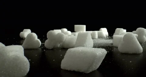 Sugar figurines, close up. Sugar figures in the shape of card suits as a symbol Stock Footage 148925342
