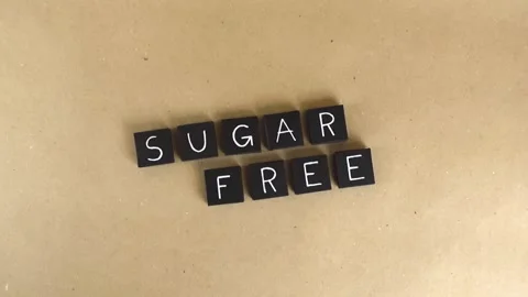 Sugar free text on a brown paper background Stock Footage 341859671