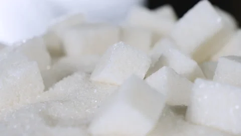 Sugar granules are on a table on granulated sugar Video stock 178463045