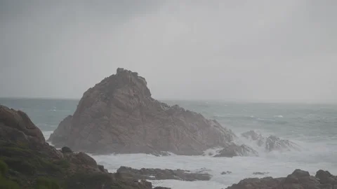 Sugar loaf rock slow motion cold front waves crashing Stock Footage 204937726