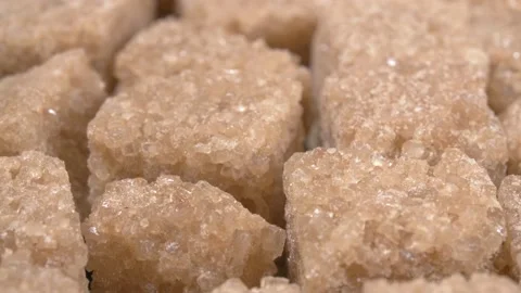 Sugar lumpy close-up. Brown sugar. Sugar cubes. Vidéo 143034743