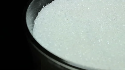 Sugar, macro on a black background sweet Vidéo 61246320