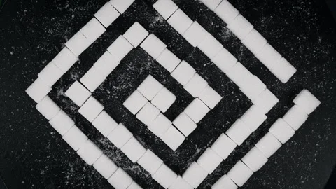 Sugar Maze Top View, Many Sugar Cubes in Labyrinth Shape Rotates Stock Footage 262267309