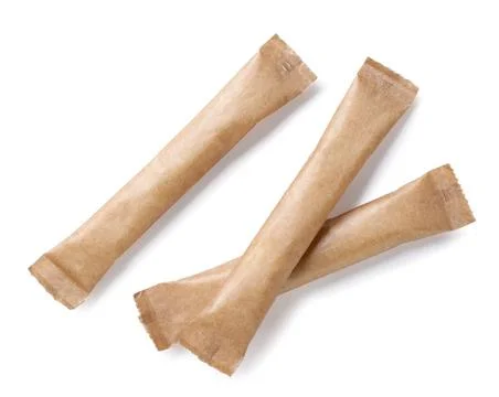 Sugar packaging on a white background. Top view, mockup Stock Photos