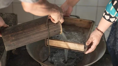 Sugar palm filtering process Stock Footage 261930865