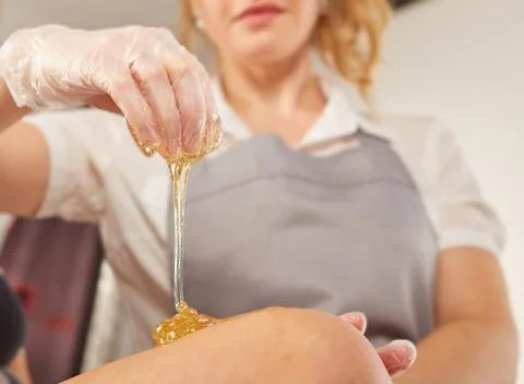 Sugar paste for depilation in the light Stock Photos