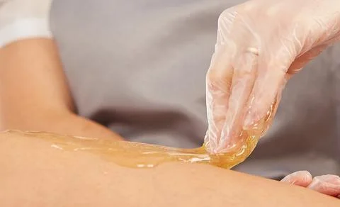 Sugar paste for depilation in the light Stock Photos