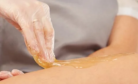 Sugar paste for depilation in the light Stock Photos