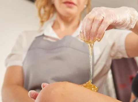 Sugar paste for depilation in the light Stock Photos