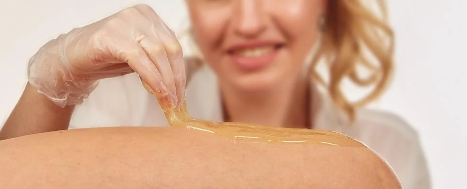Sugar paste for depilation in the light Stock Photos