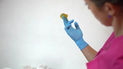 Sugar paste on a hand in glove. Sugaring salon Stock Footage 256069605