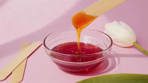 Sugar paste for shugaring on a pink background. Stock-Footage 153101668