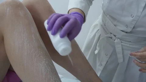 Sugar paste. Sugaring, depilation. Smooth skin legs. Waxing with sugar. Stock Footage 89063652