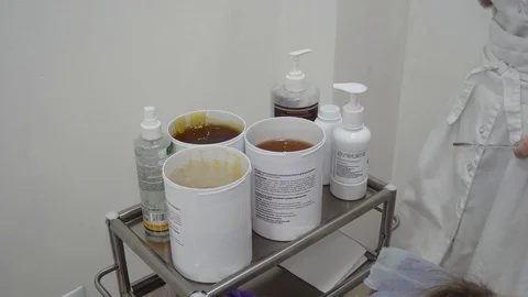 Sugar paste. Sugaring, depilation. Smooth skin legs. Waxing with sugar. Stock Footage 89063722