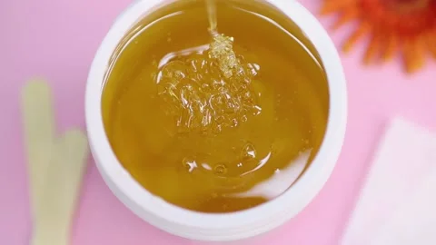 Sugar paste in a white jar on a pink background 스톡 동영상 137649217