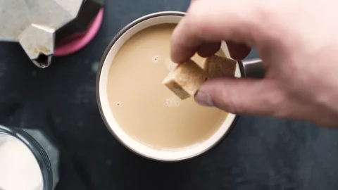 Sugar poured into coffee 스톡 동영상 86015328