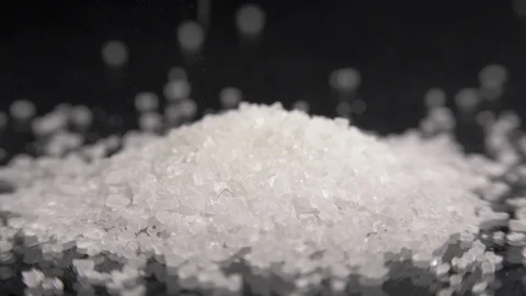 Sugar raining on the table in kithchen Stock Footage 86392567