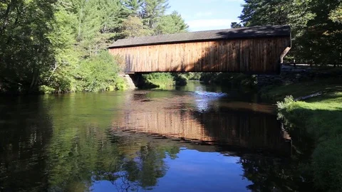 Sugar River running under the Corbin Covered Bridge Stock Footage 95639705