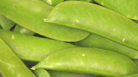Sugar snap peas loop close-up - HD Stock Footage 399762