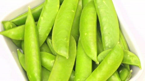 Sugar snap peas loop - HD Stock Footage 399745