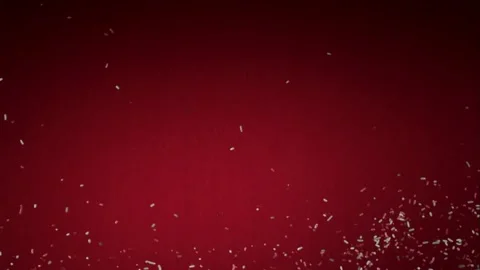 Sugar sprinkles fall against dark red background Stock Footage 326751216