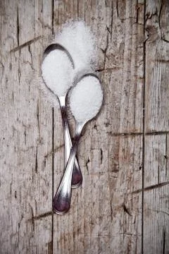 Sugar in two spoons Stock Photos