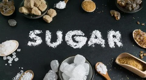 Sugar variation set on dark stone background Stock Photos