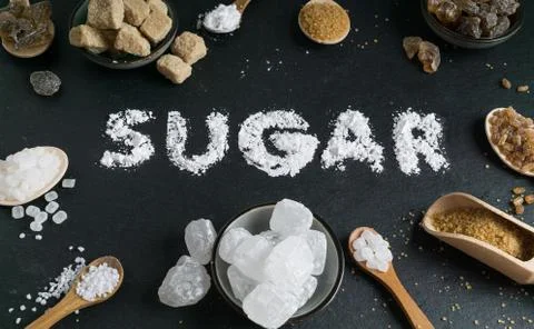 Sugar variation set on dark stone background Stock Photos