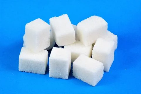 Sugar white dessert cubes. Stock Photos