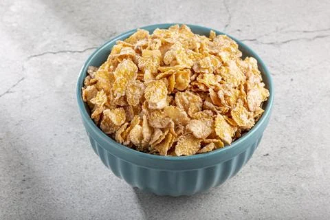 Sugared corn flakes in the bowl. Stock Photos