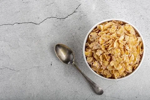 Sugared corn flakes in the bowl. Stock Photos