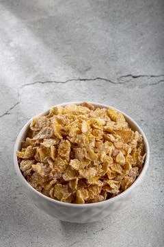 Sugared corn flakes in the bowl. Stock Photos
