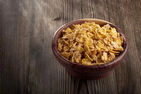 Sugared corn flakes in the bowl. Stock Photos