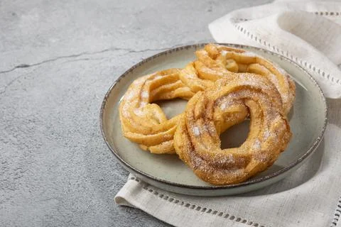 Sugared donuts on the table. Brazilian donuts. Stock Photos