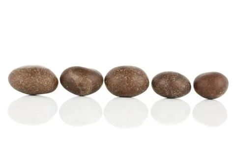 Sugared nut dragee isolated on white Stock Photos