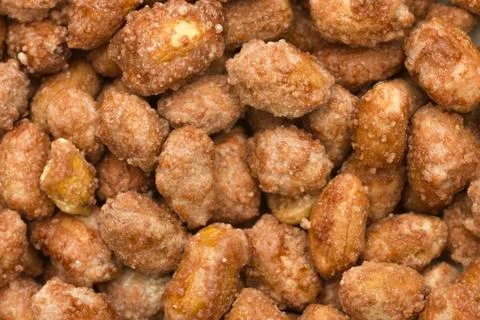 Sugared  peanut pile background closeup Stock Photos