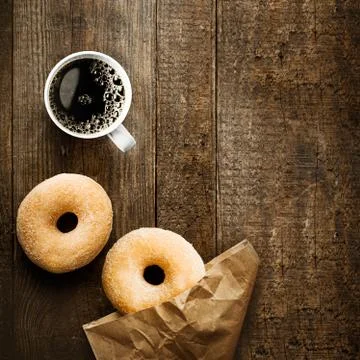 Sugared ring doughnut with espresso coffee Stock Photos