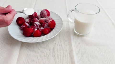 Sugared Strawberries in Soft Light: A Taste of Morning Calm Video stock 311640654