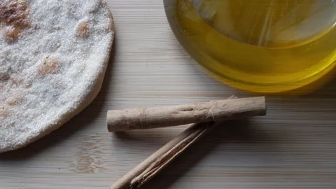 Sugared torta de aceite with olive oil and cinnamon, rustic traditional Spanish Stock Footage 311436812