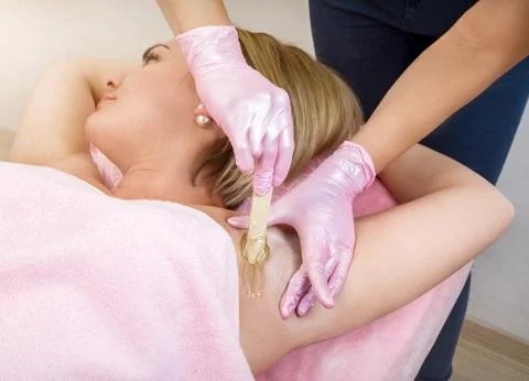 Sugaring under armpit Spa Stock Photos