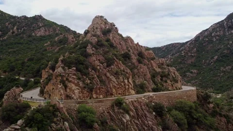 Suggestive aerial view of a mountain landscape and road Stock Footage 242009980