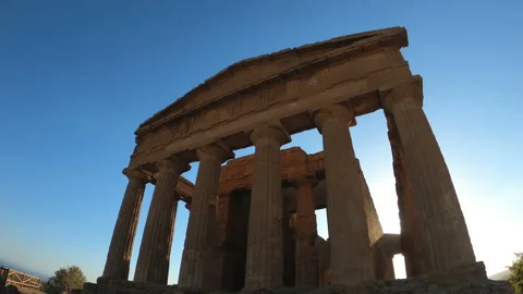 Suggestive view of temple of concord at sunset, valley of temples, agrigento Stock Footage 140044334