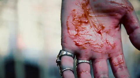 Suicidal man cutting veins, blood running down person's hand, clenching fist Stock Footage 59083193