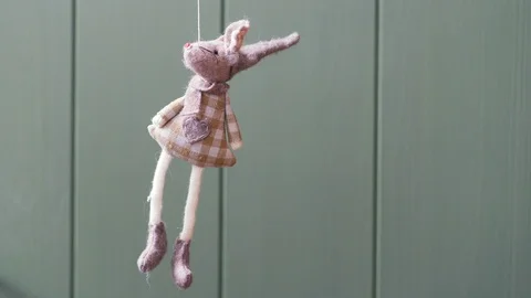 Suicide concept. Toy is hanging on a string. Stock Footage 111867111