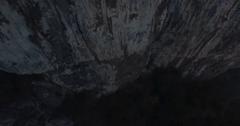 Suicide Jumping Off A Cliff Drone View 4K Stock Footage 81220136