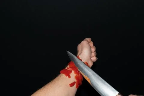 Suicide with a sharp knife Stock Photos