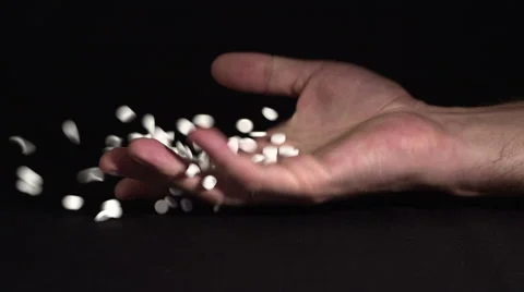 Suicide tablet concept. Man's hand falling down. Slow motion Stock Footage 68404598