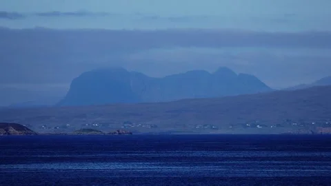 Suilven with the Caledonian MacBrayne ferry in the foreground Stock Footage 242944713
