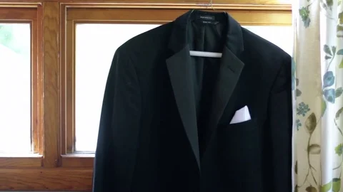 Suit Jacket Hanging On Window Stock Footage 74206707