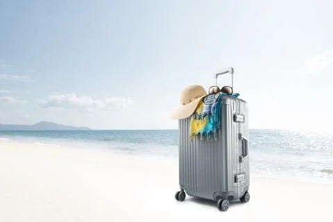 Suitcase on beach 写真素材